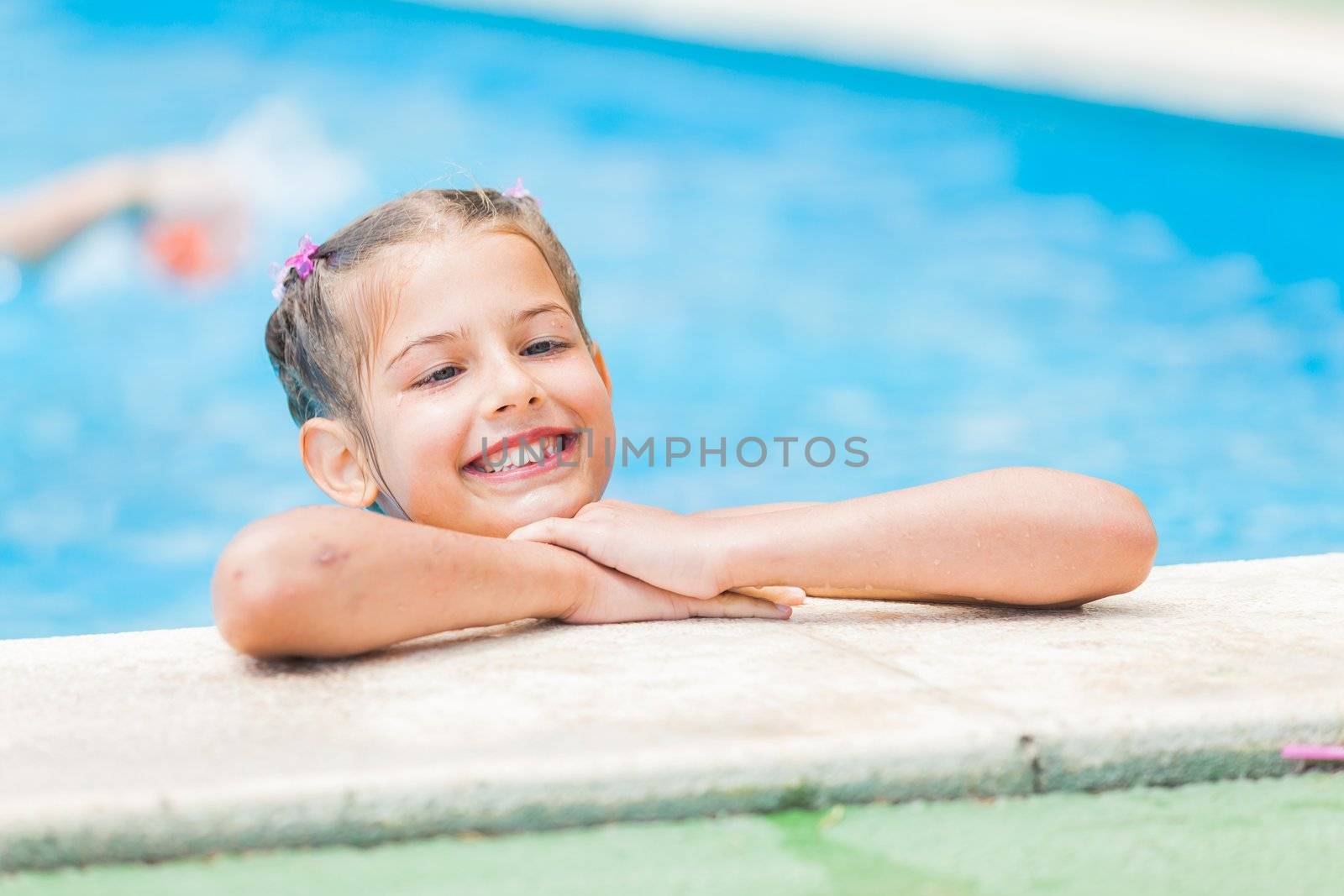 Pretty young girl at pool by maxoliki