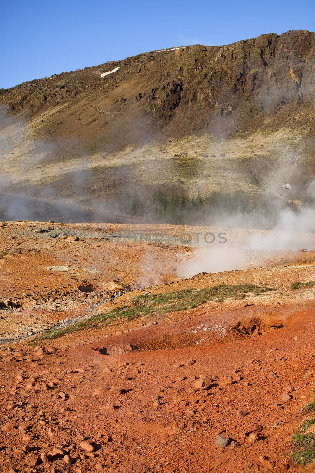 Smoke rising from hot springs in Iceland
