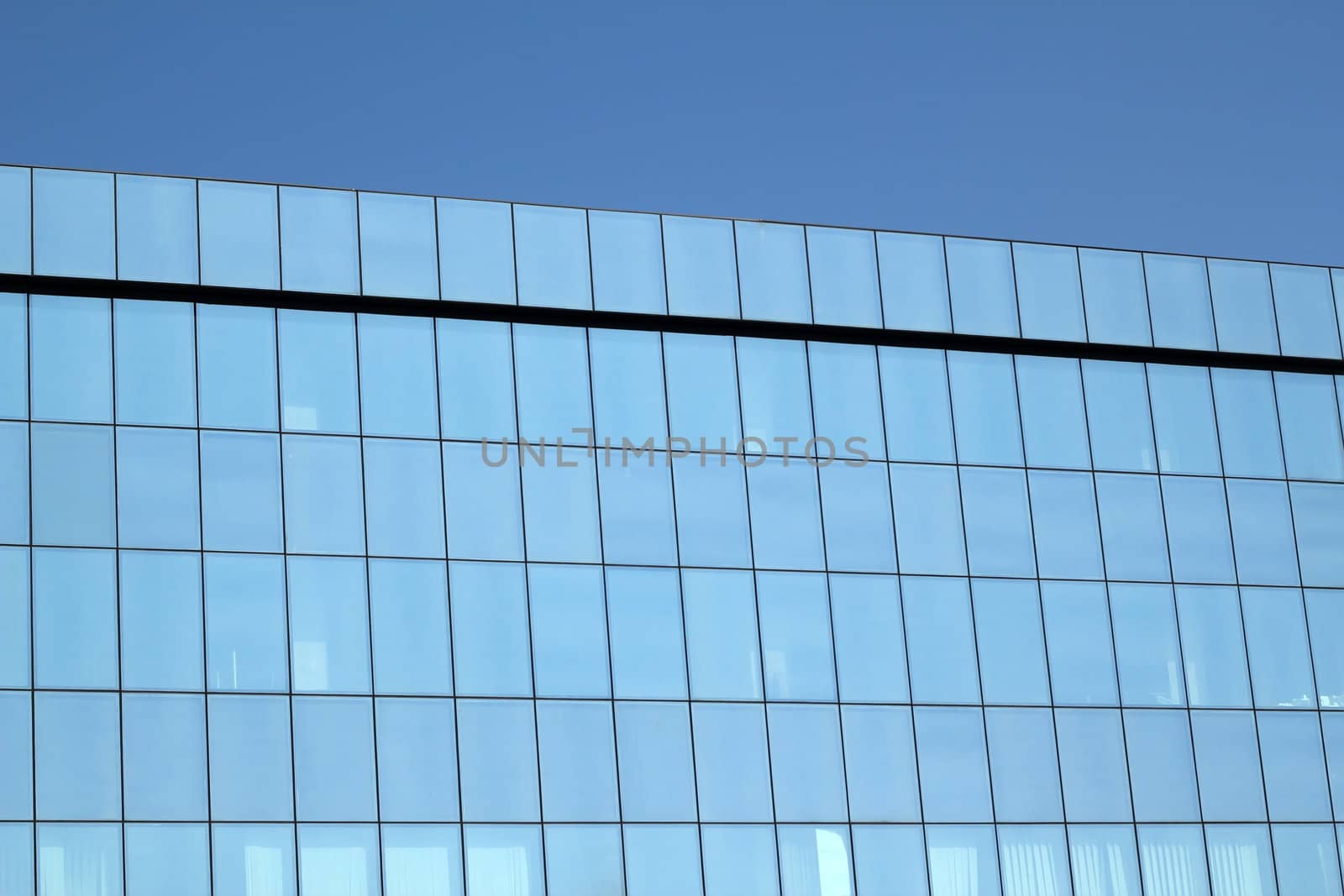 high blue glass wall