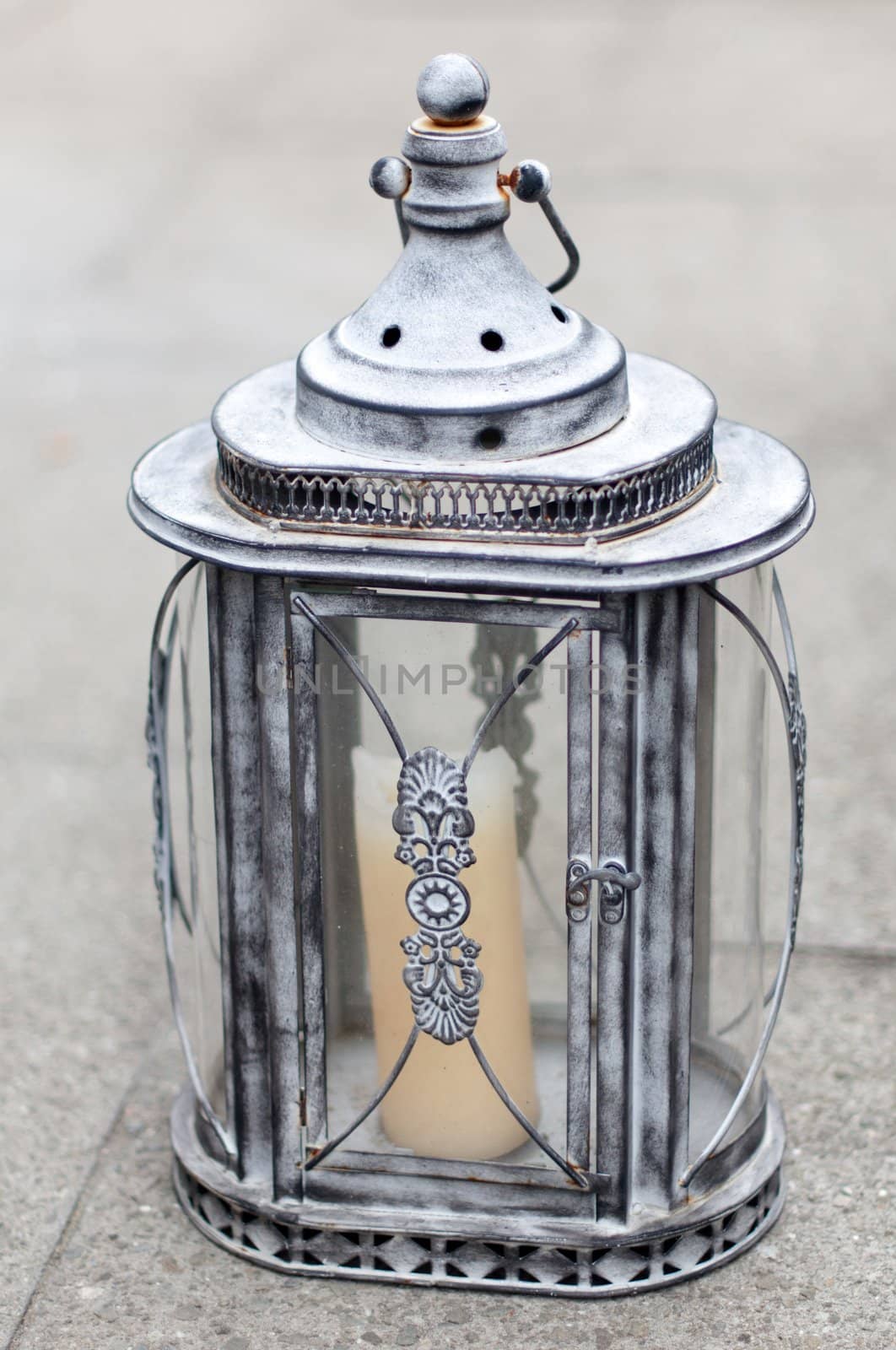 beautifully decorated lantern with a bright candle inside