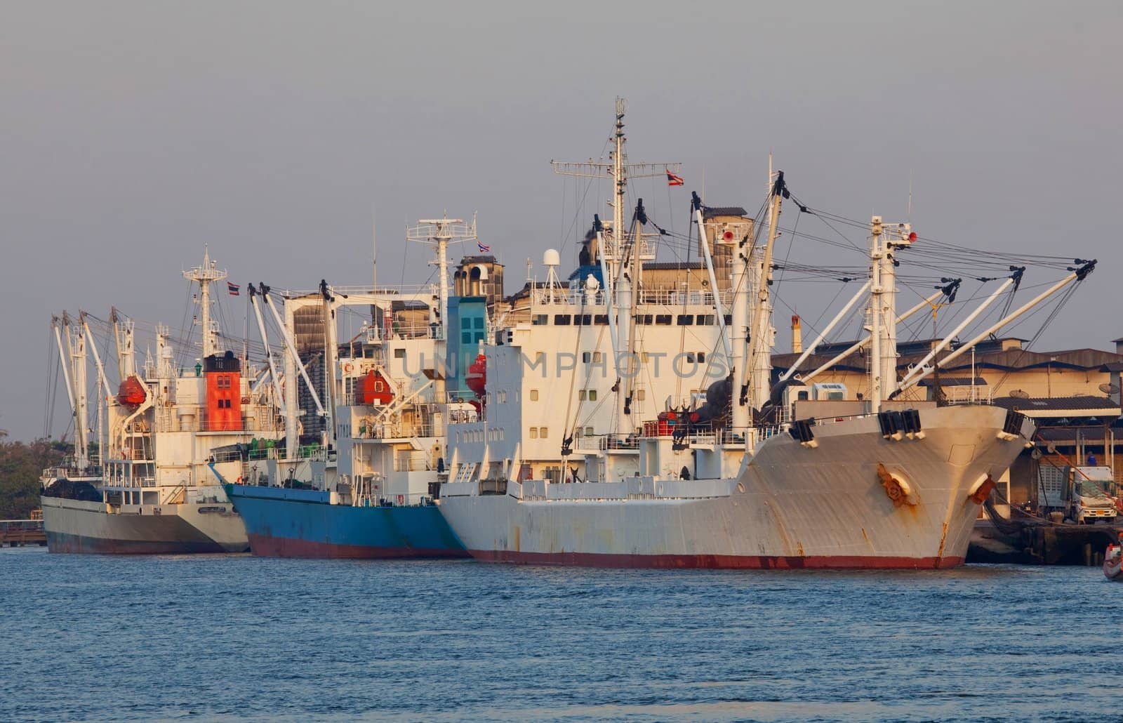 Cargo ship under loading in port