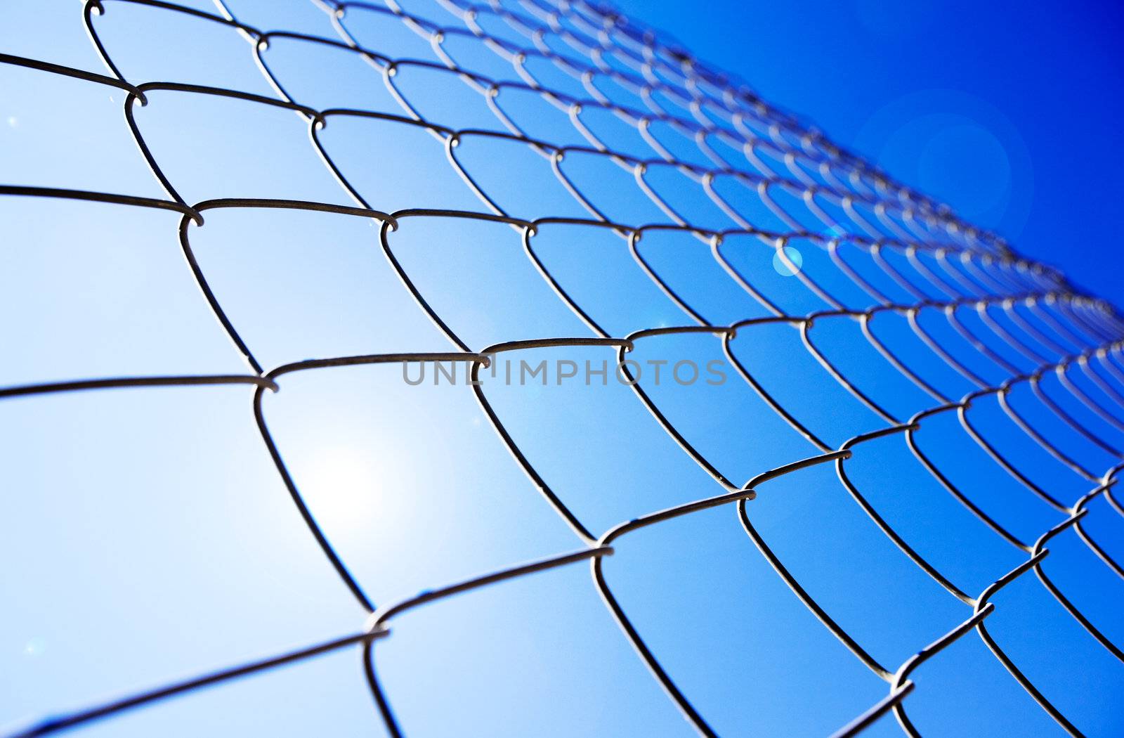 Abstract background with metal gate and sunshine
