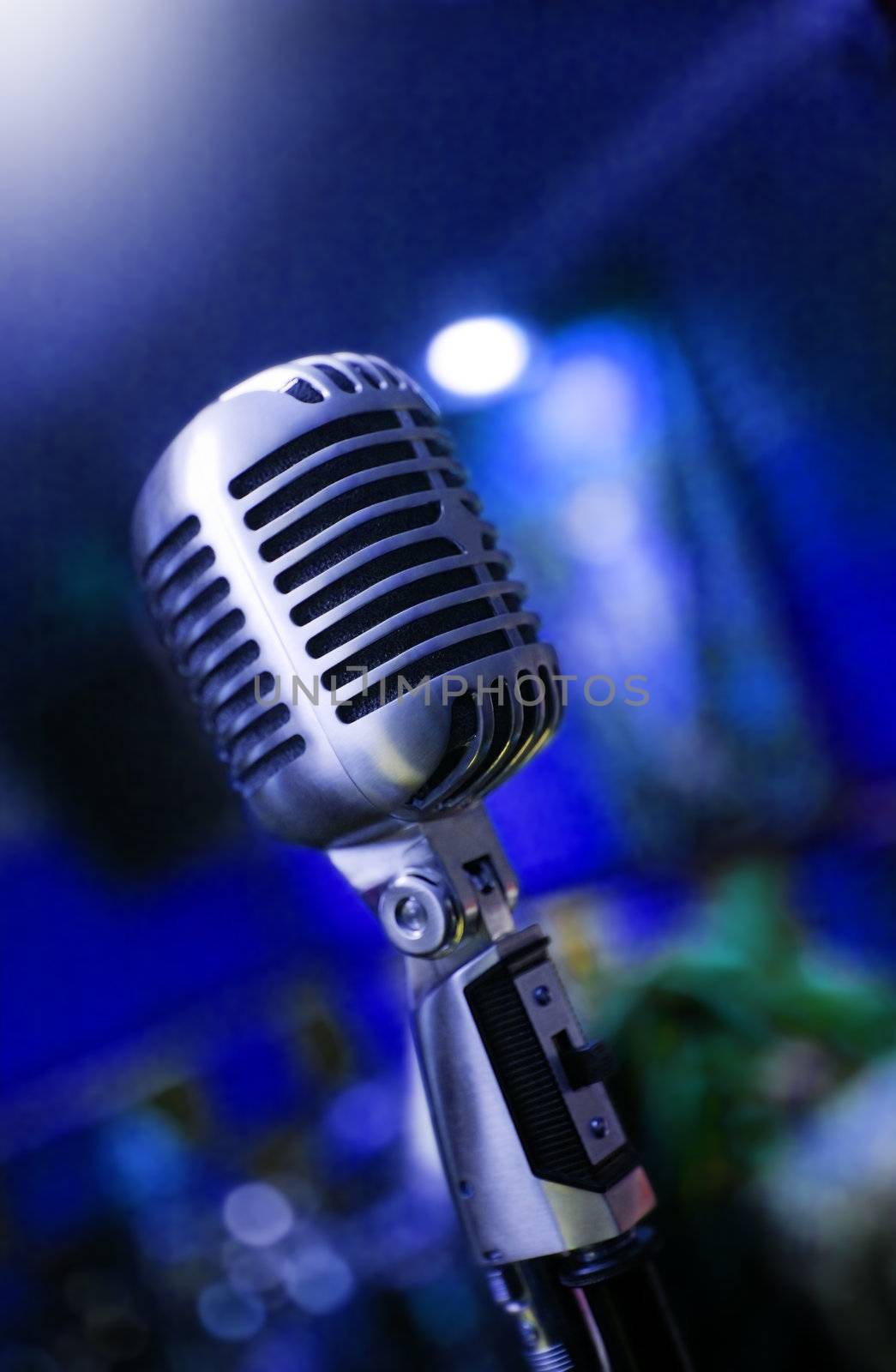 Music background with close up image of retro microphone