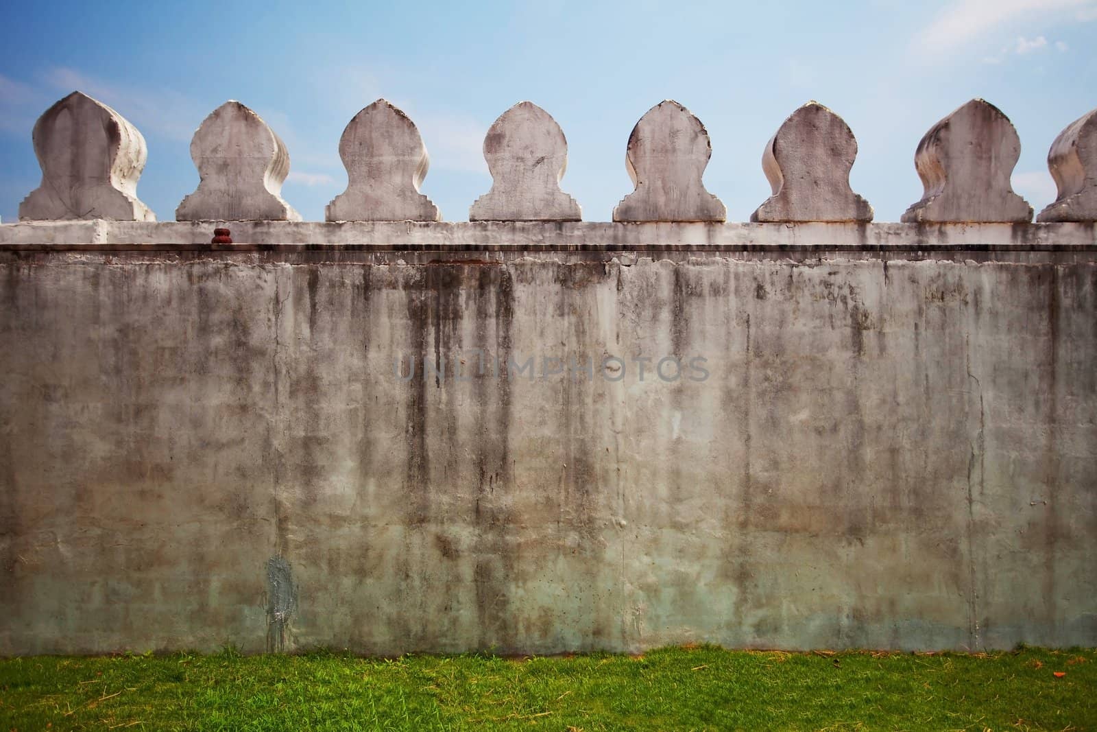 Wall on the fields with blue sky