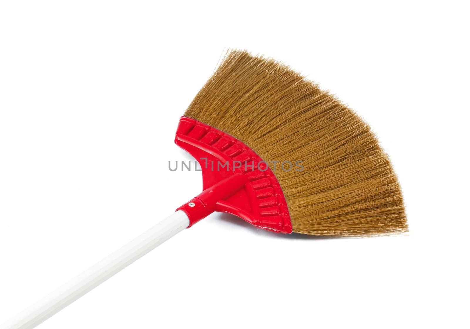 Red broom isolated on white