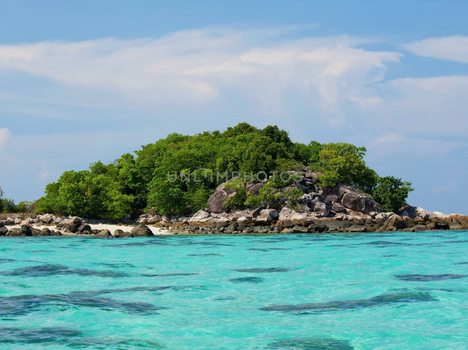 Beautiful tropical beach with big stones