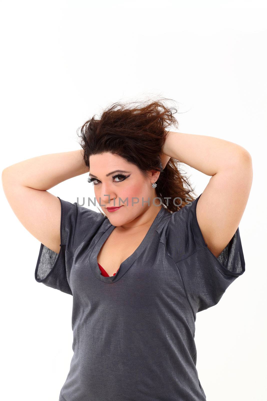 Sexy plus size woman in grey shirt