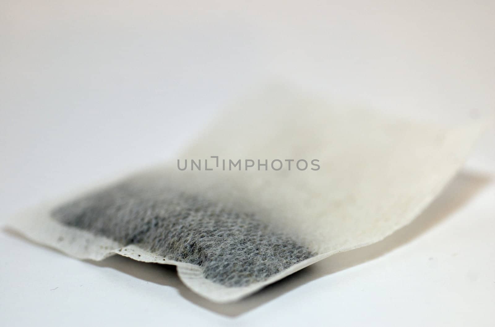 Isolated tea bag against white background with copy space