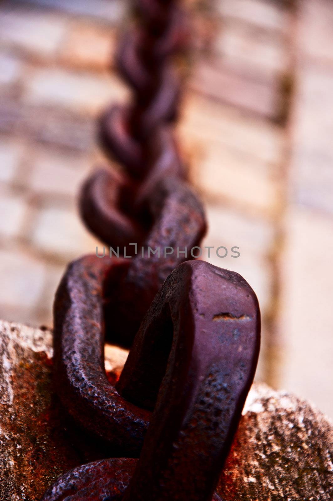 Old forged chain on quay  Stockholm  Sweden