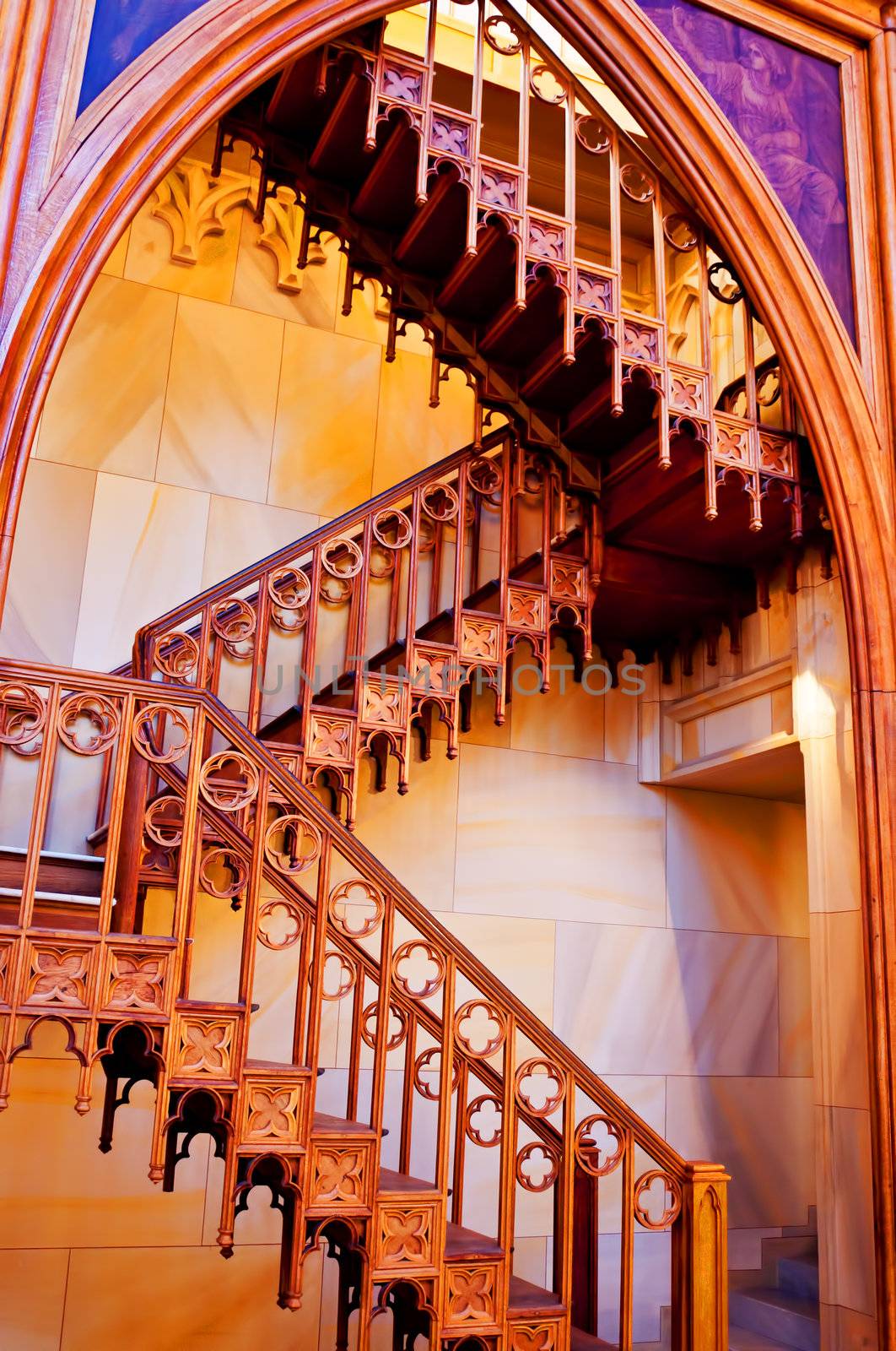 Wooden staircase inside of catholic church  by Nanisimova