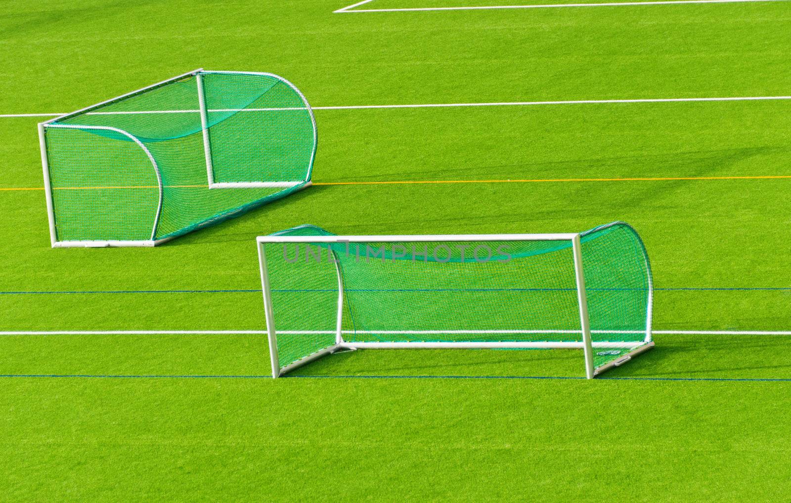 Football goals next to each other  on football field