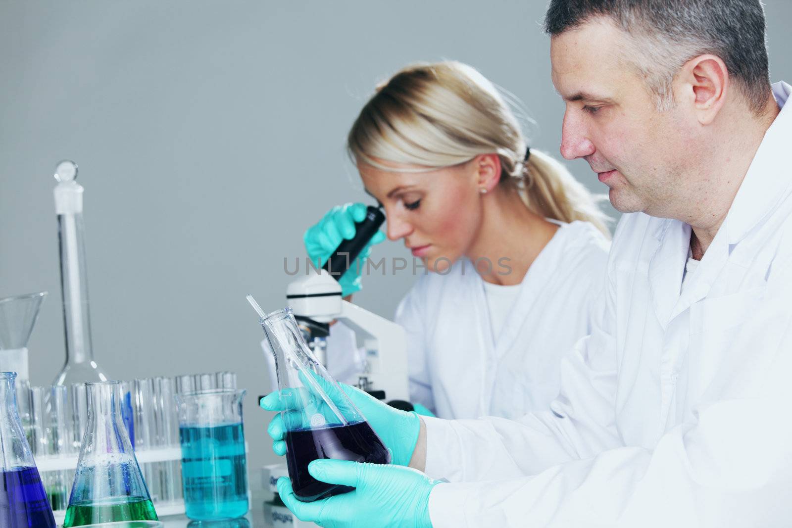 Chemistry Scientist conducting experiments in laboratory