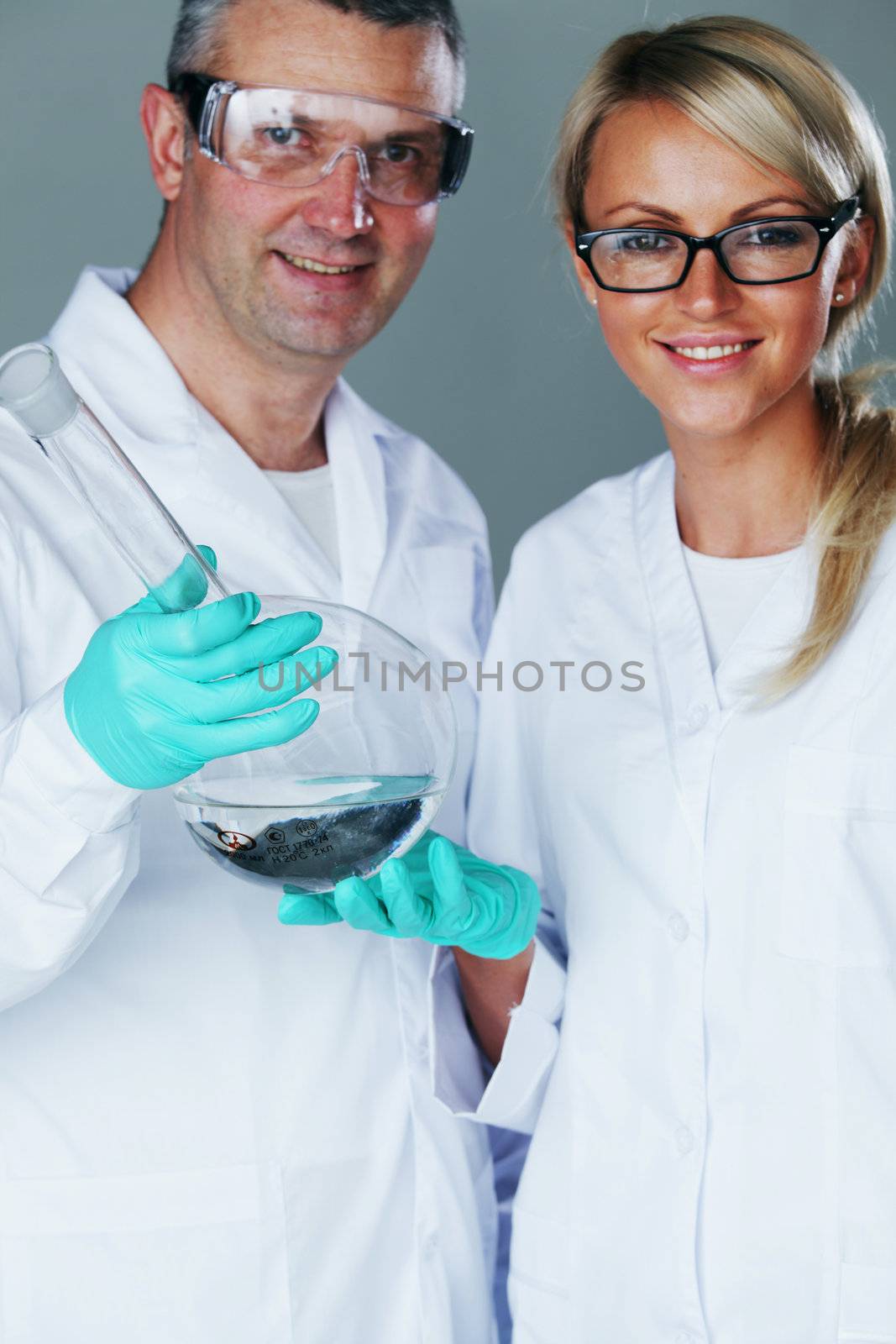 Cheerful chemistry researchers by Yellowj