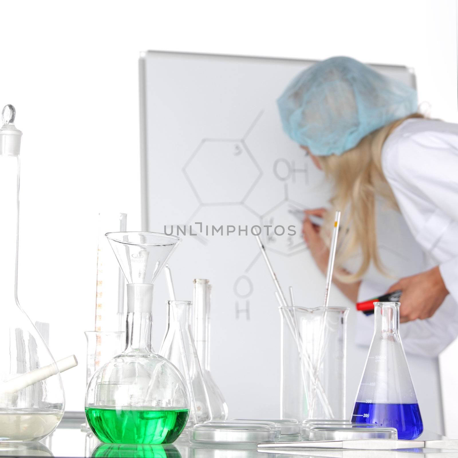 Woman  conducting a chemical experiment