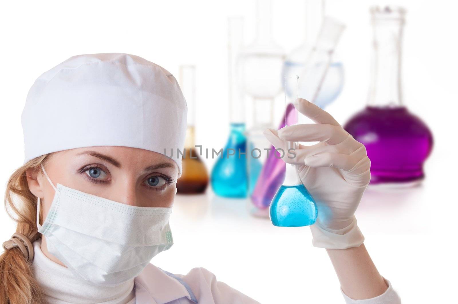 Scientist woman in lab coat with chemical glassware by Angel_a