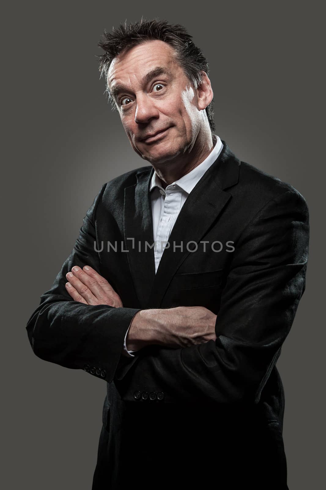 Surprised Business Man on Grey Background High Contrast Look by scheriton