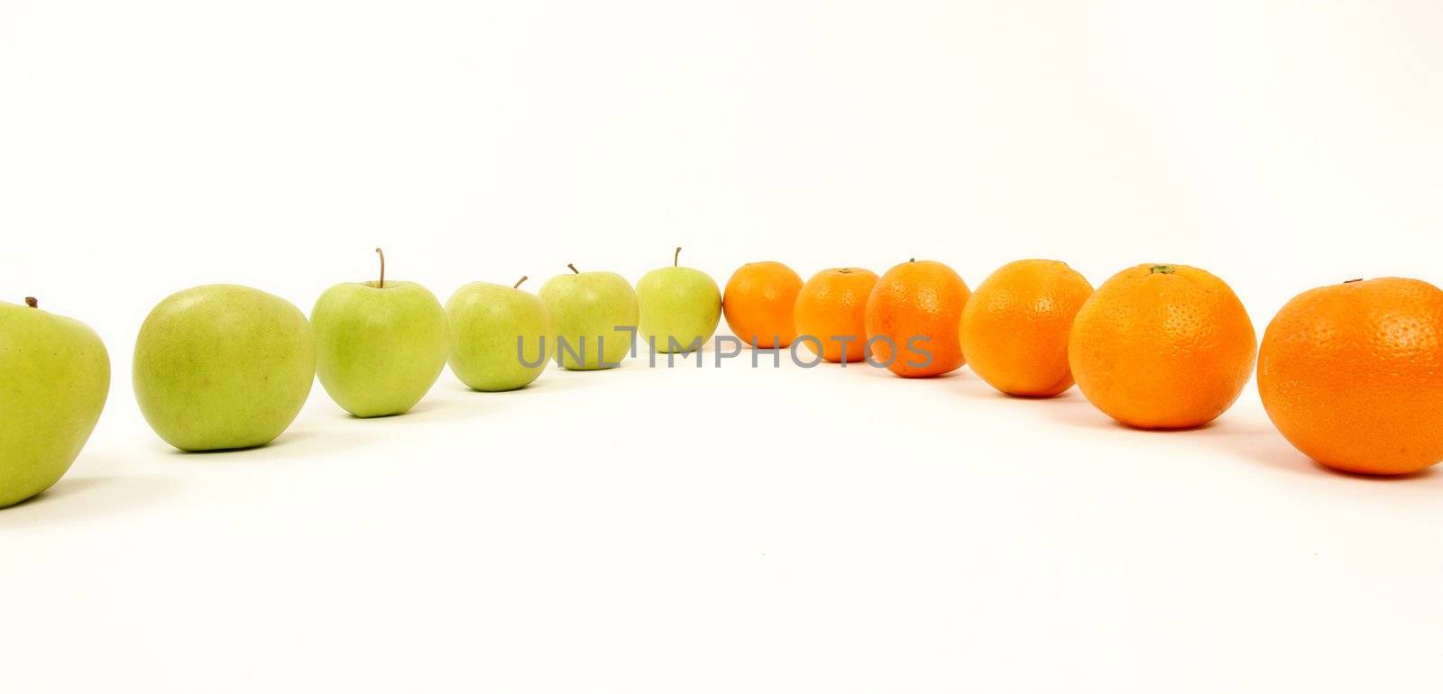 apple and oranges arranged to symbolize leadership, teamwork, network, discrimination............