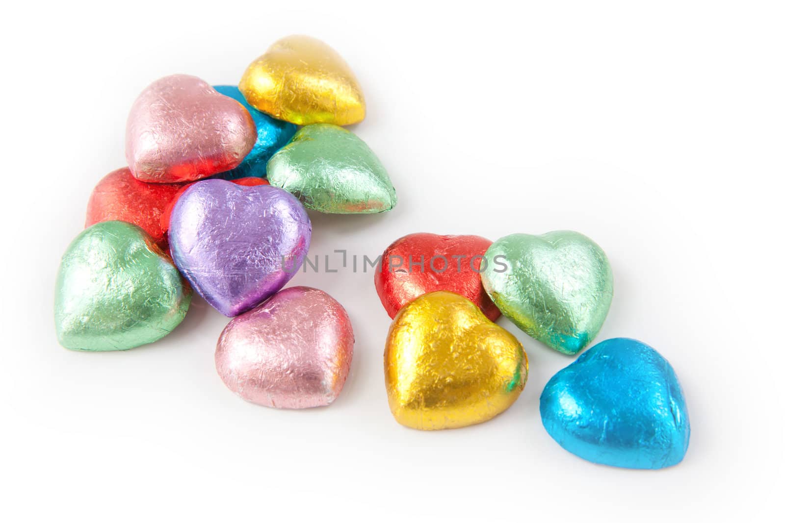 Chocolate heart shaped cookies on white background