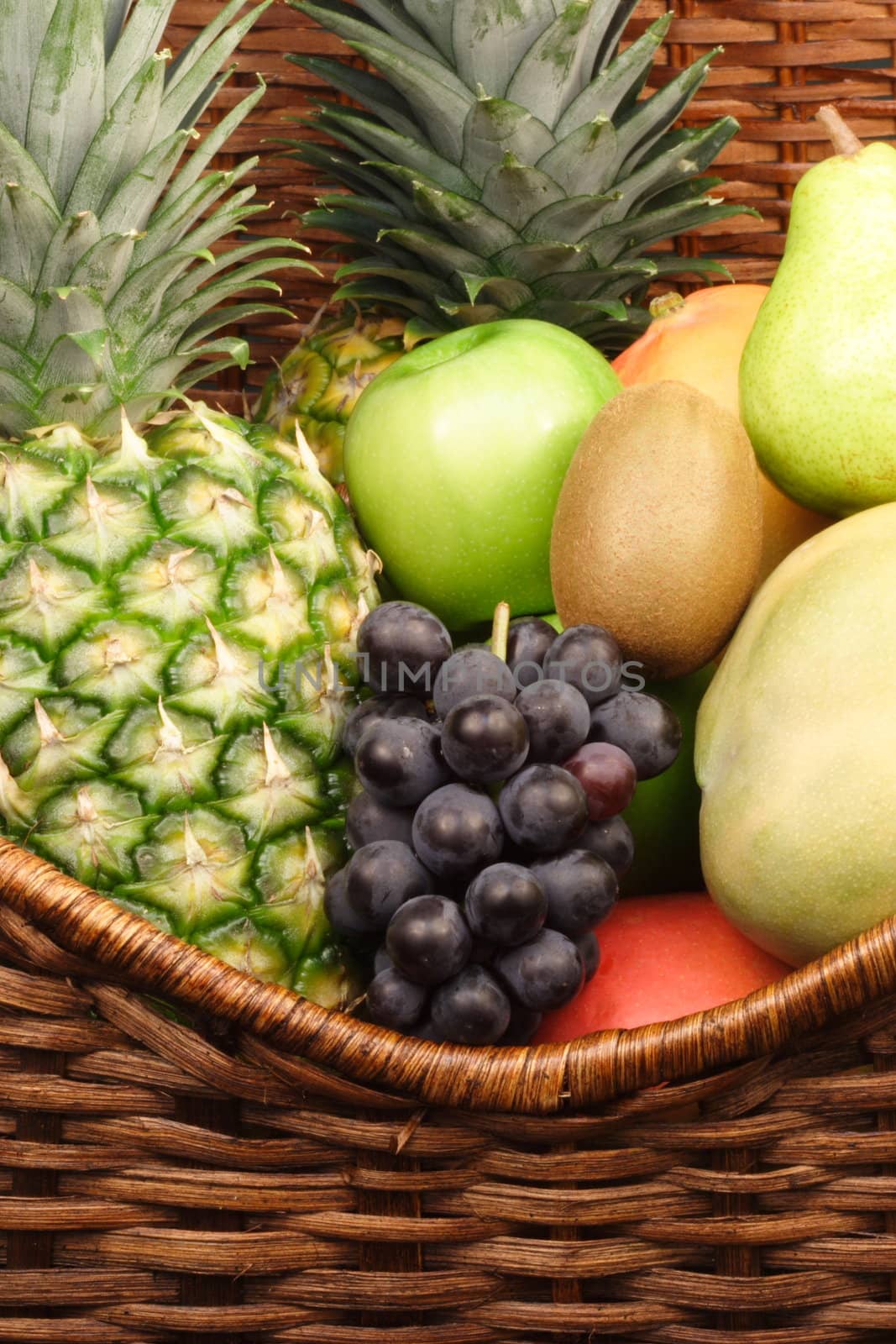 fresh healthy fruits in a basket showing the beauty of nture 