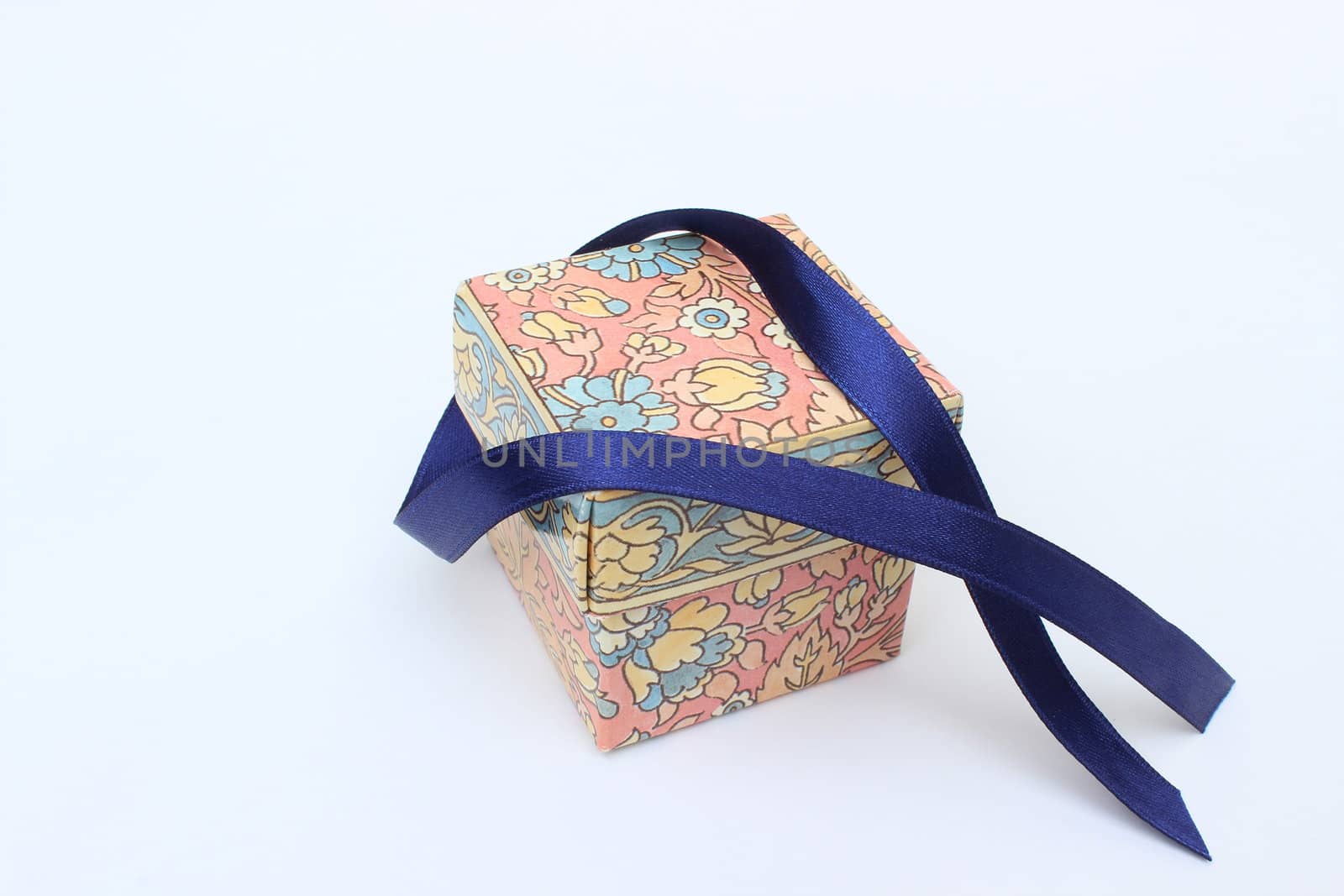 image of blue bow on colored gift box 