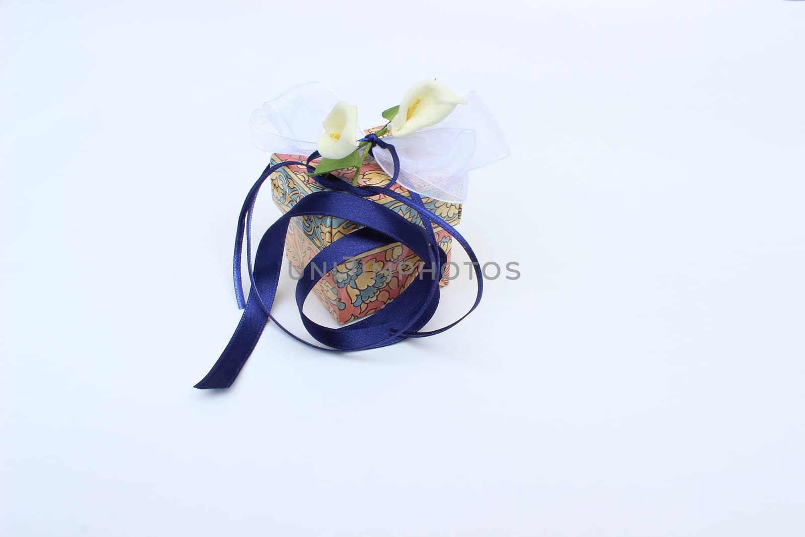 fine image of nice gift box with decorative flowers and bow