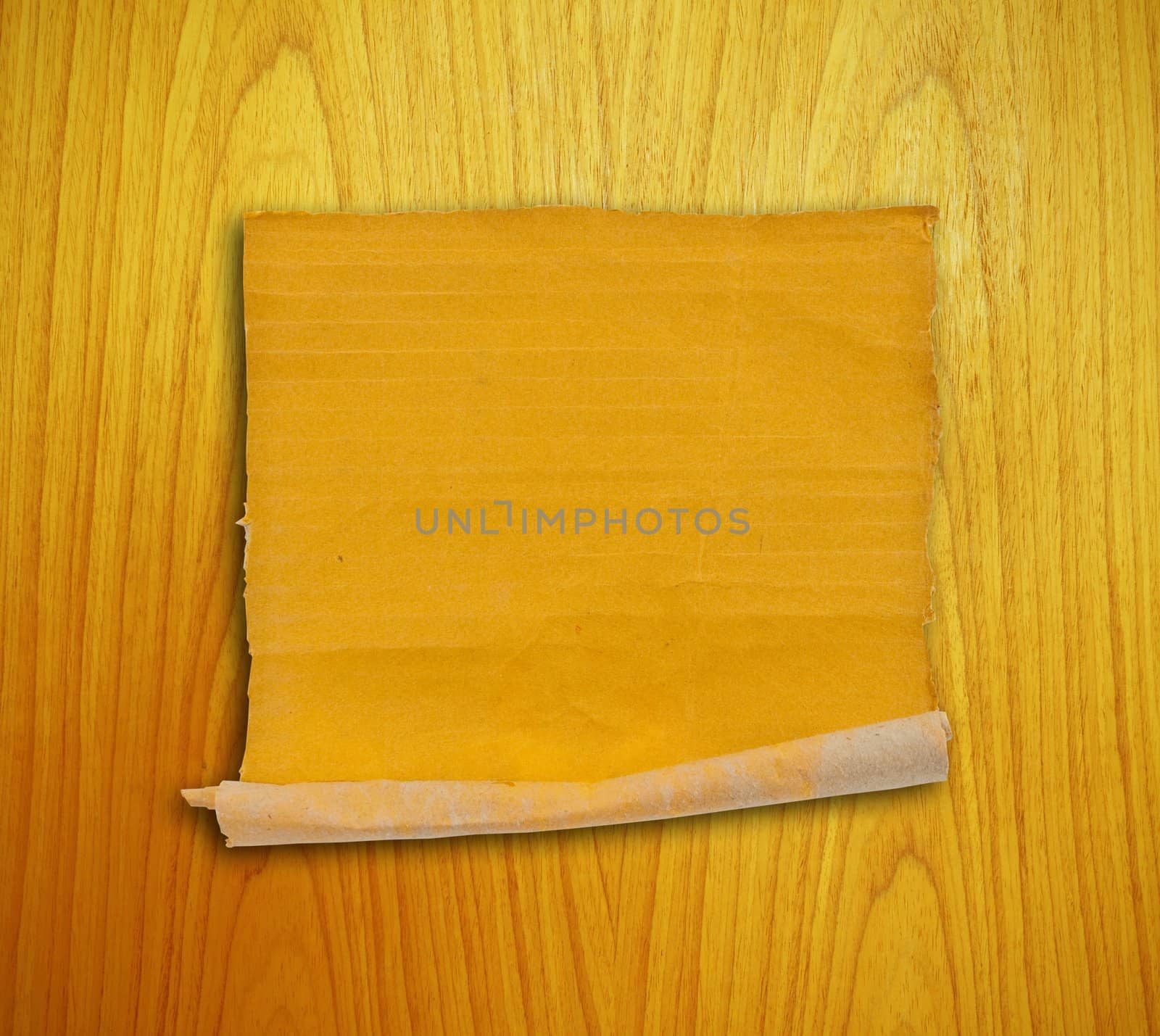 piece of corrugated cardboard on the wood background