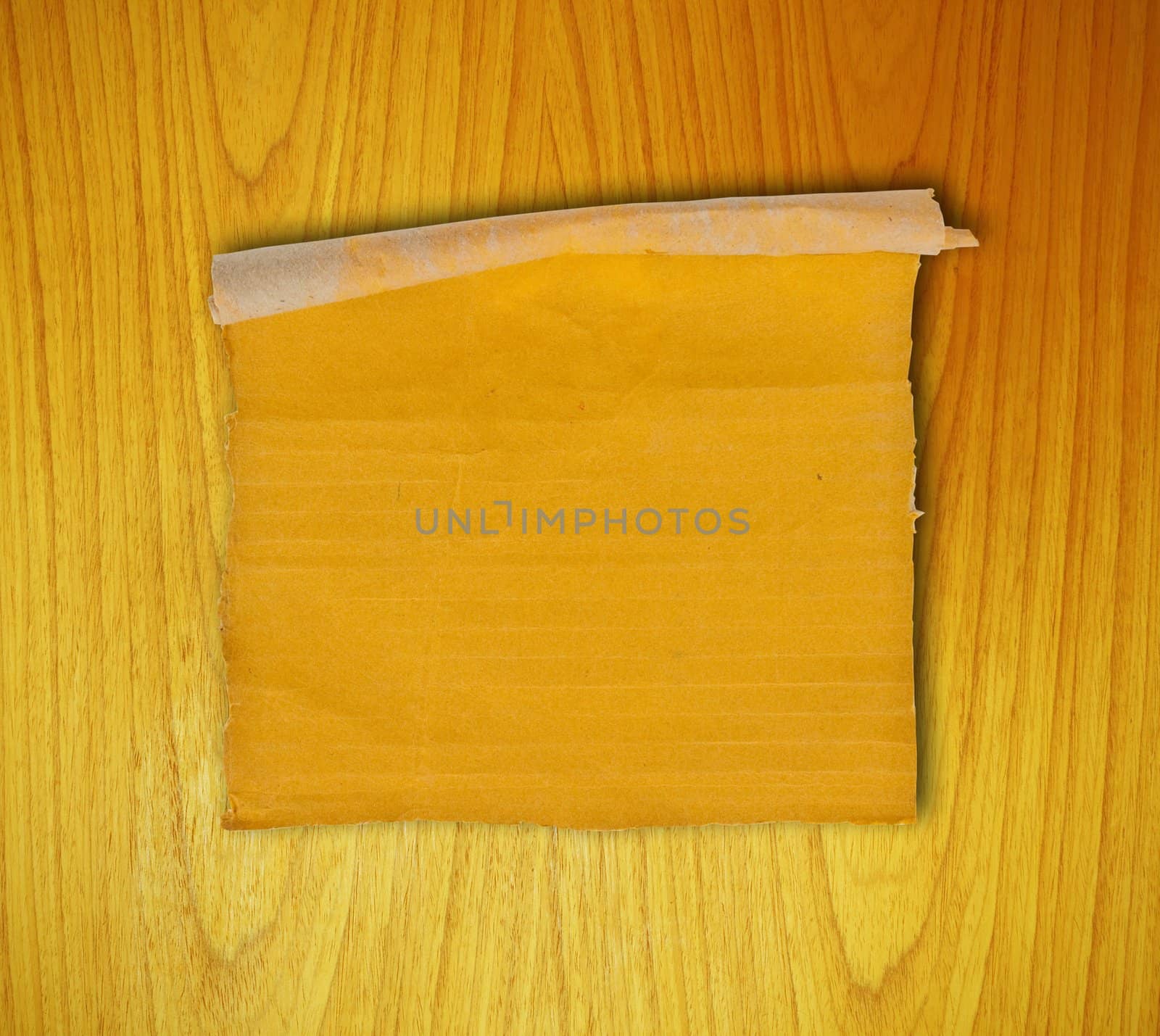 piece of corrugated cardboard on the wood background