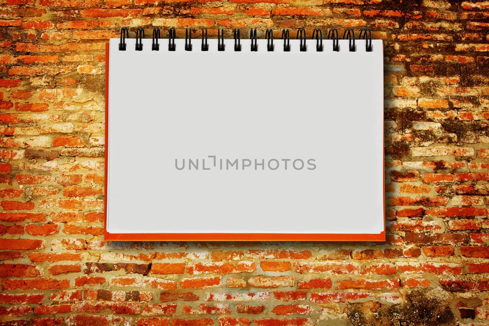 notebook on the brickwall