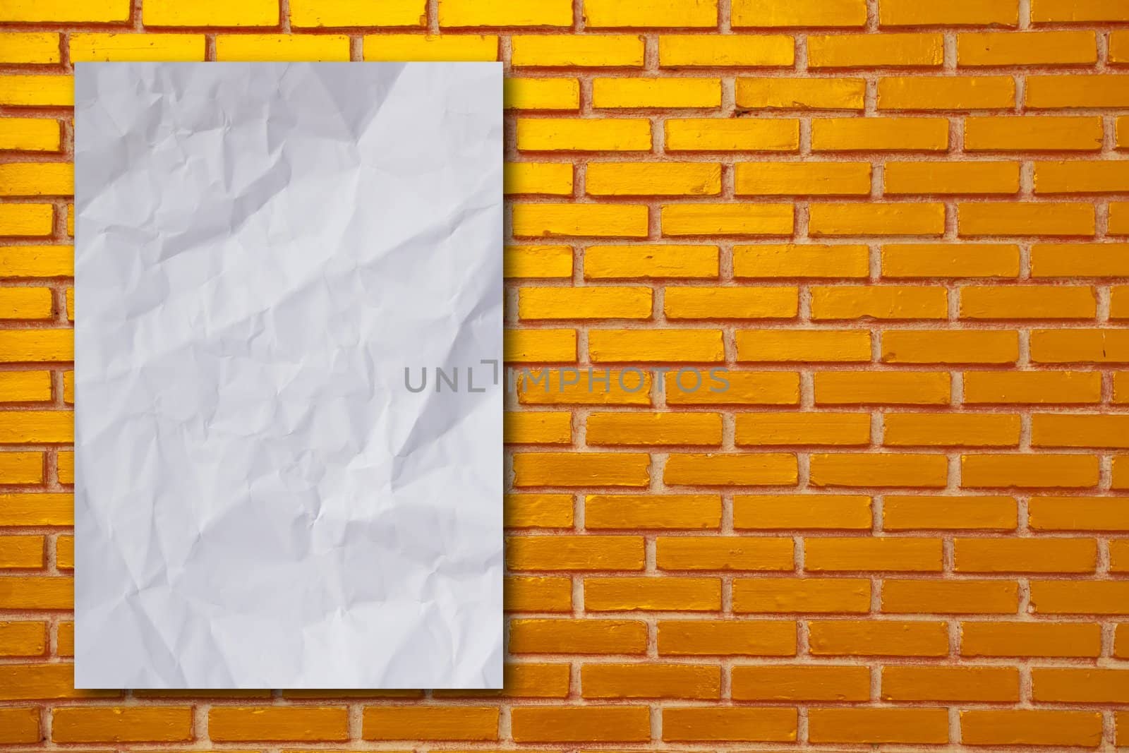 old paper on brickwall