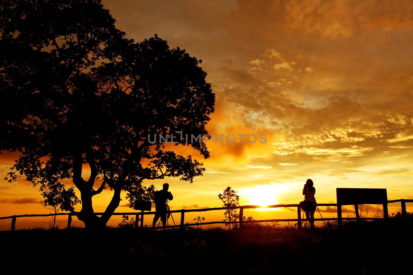 silhouette of photographers on the Mountain