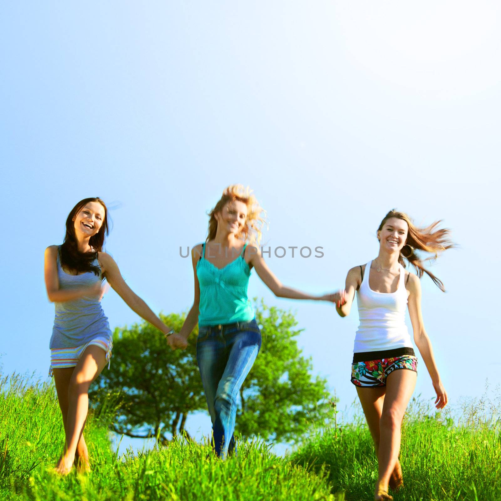 fun smile girlfriends run by green field sun is shine