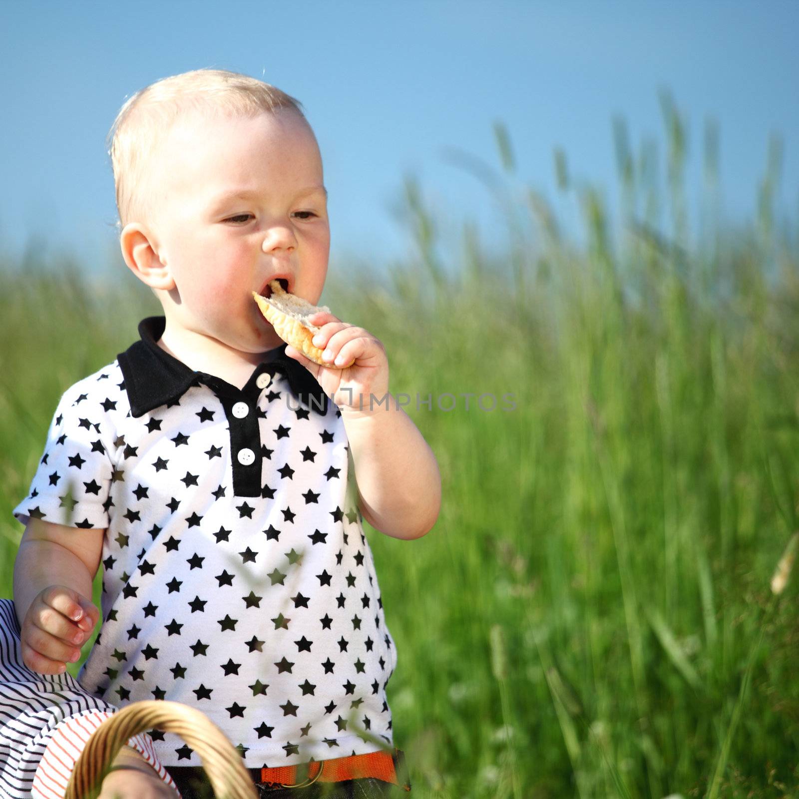 boy joy in green grass