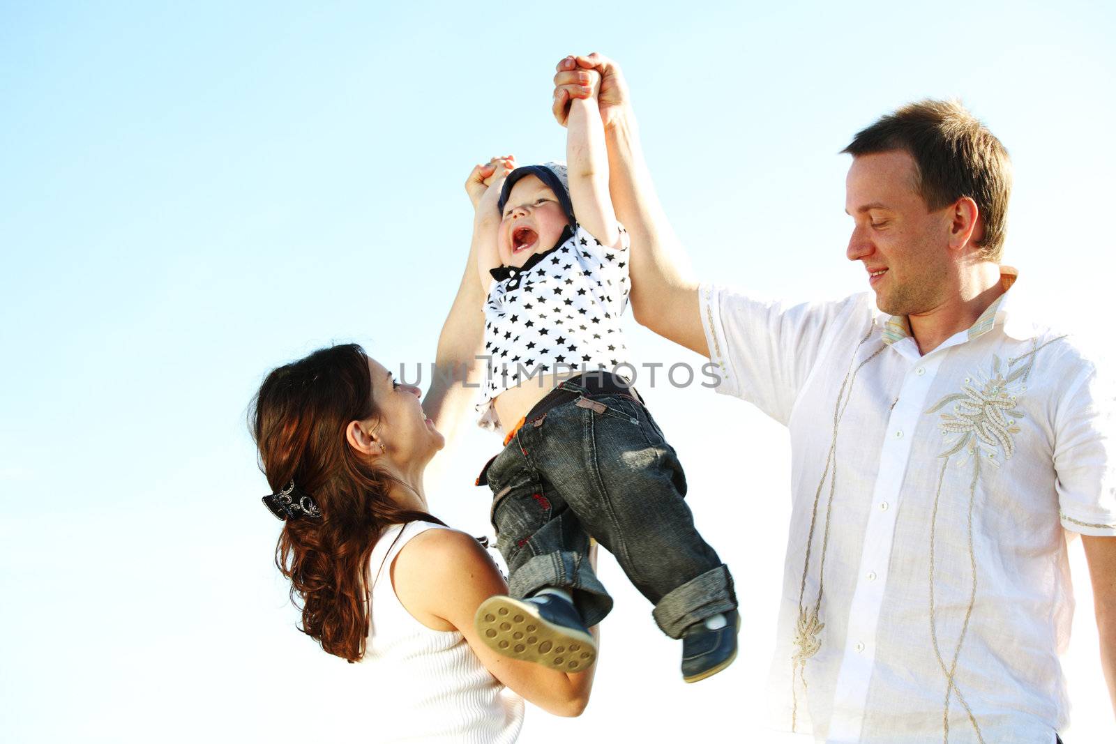 happy family on blue sky background