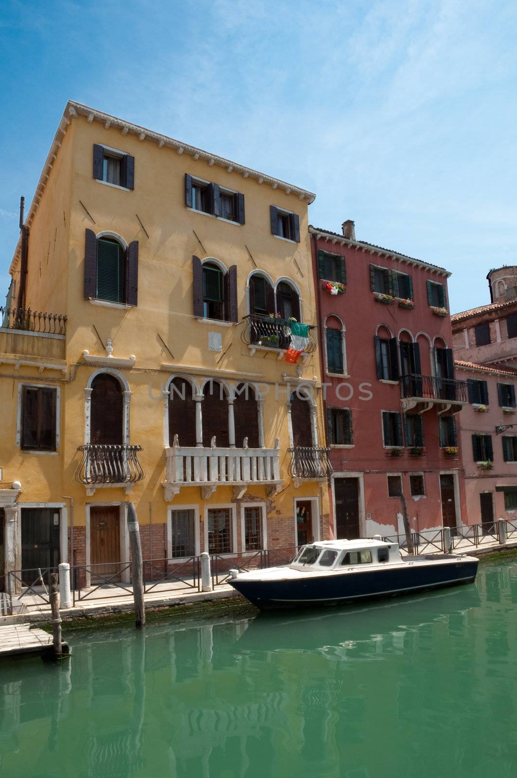 Colorful typical houses and canal at Venezia