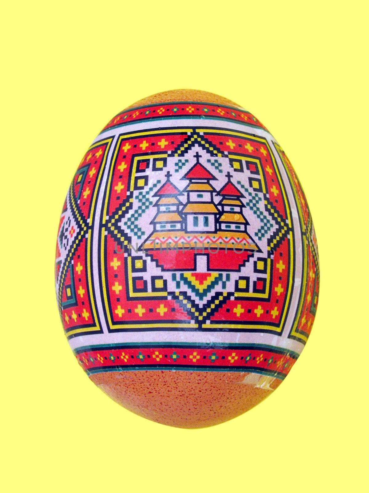 painted Easter egg over yellow
