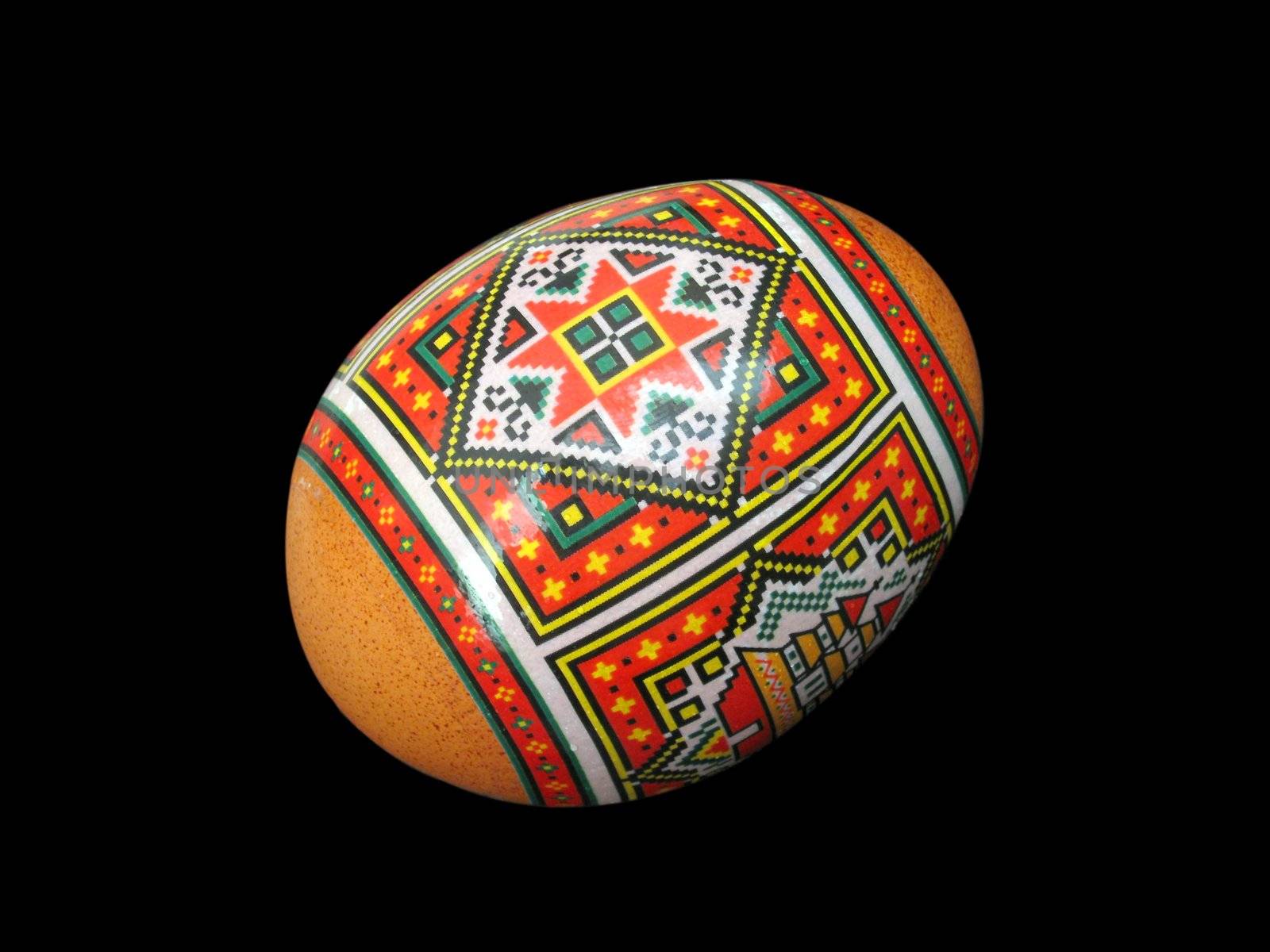 painted Easter egg over black