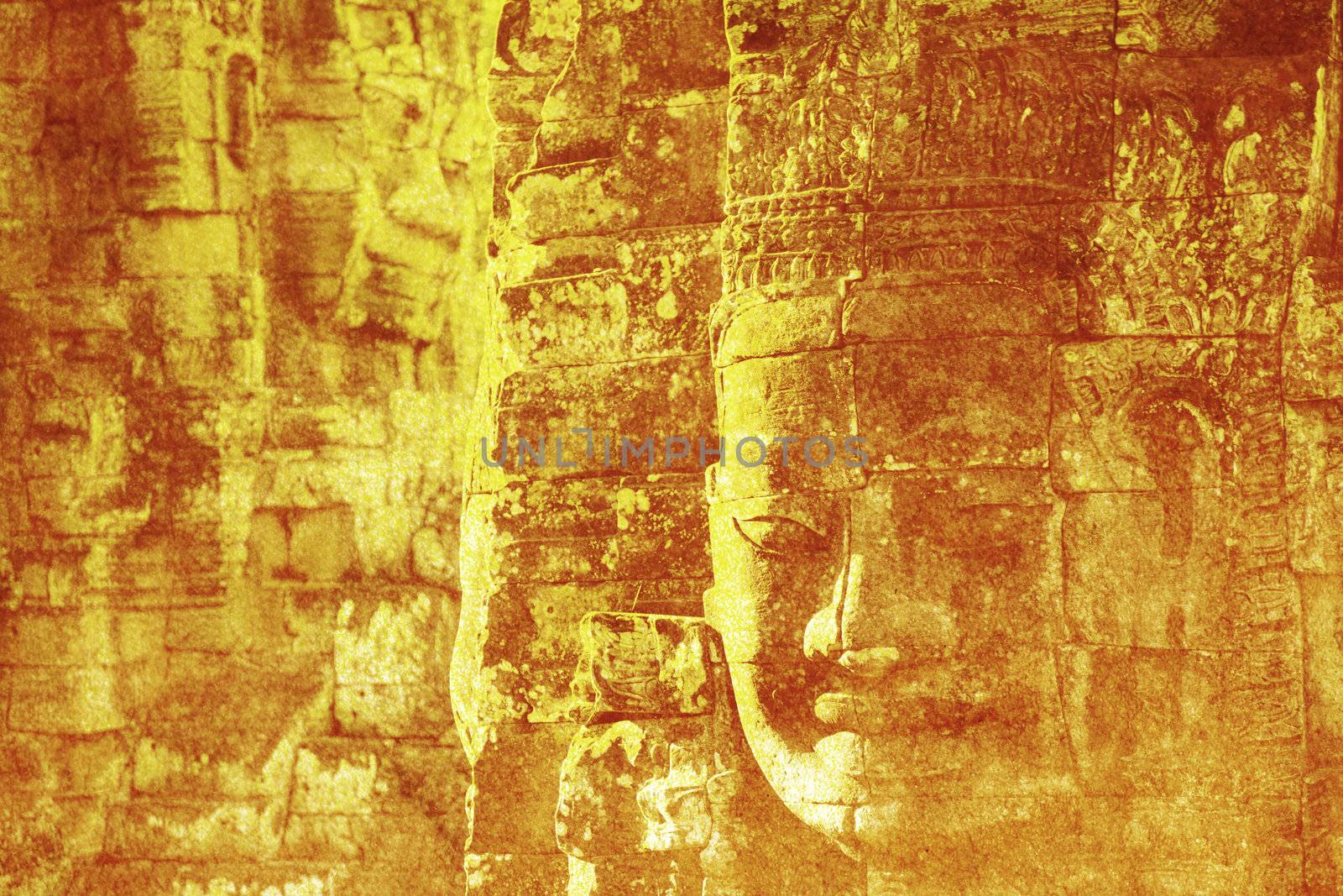 Faces carved into stones in Bayon temple in Angkor Cambodia