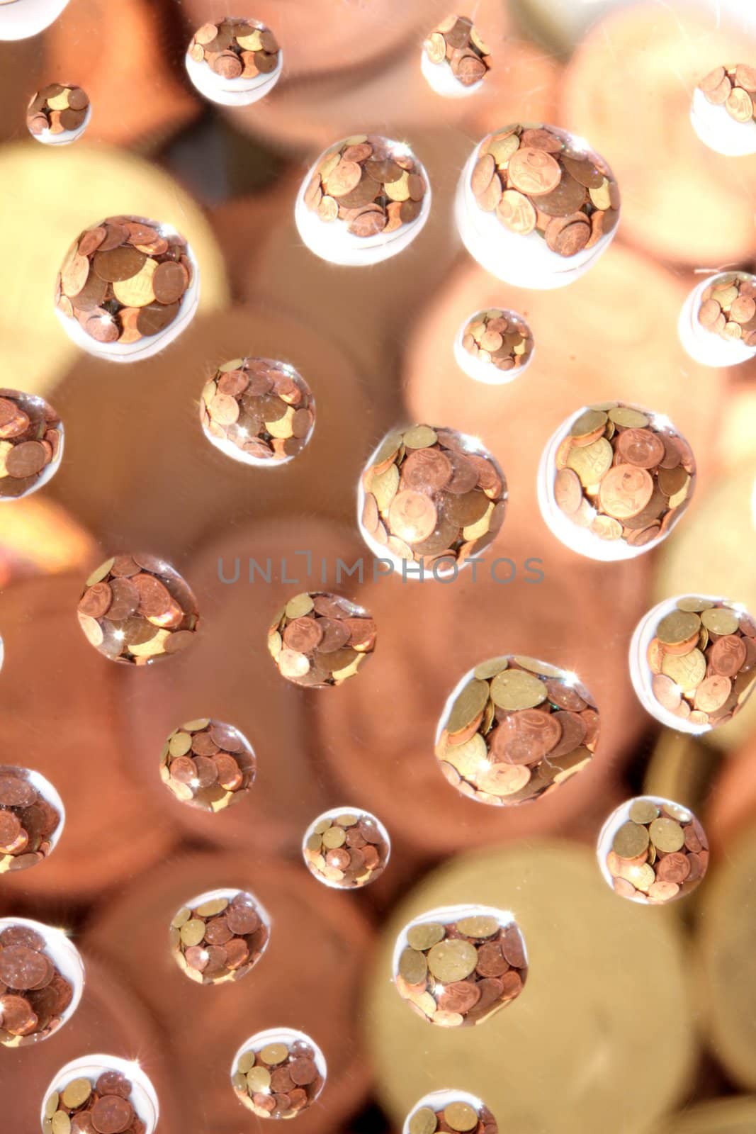 euro coins in water drops