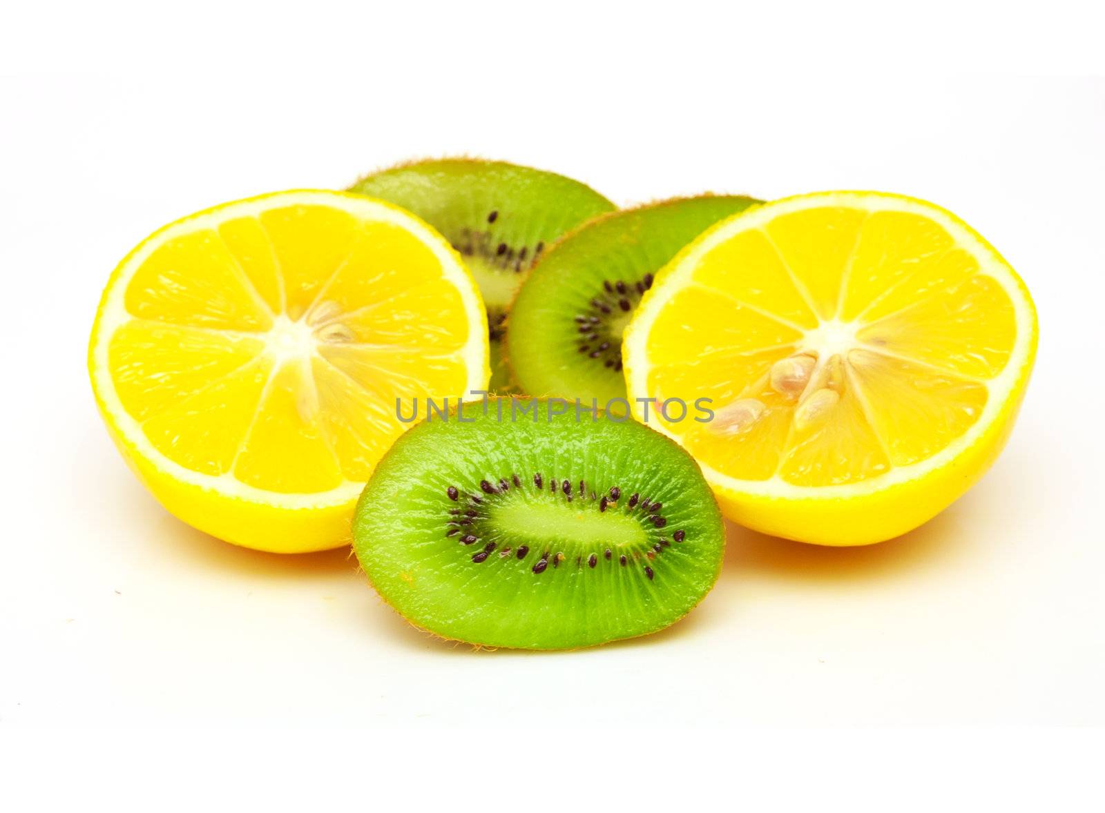 Lemon and  kiwi on a white background