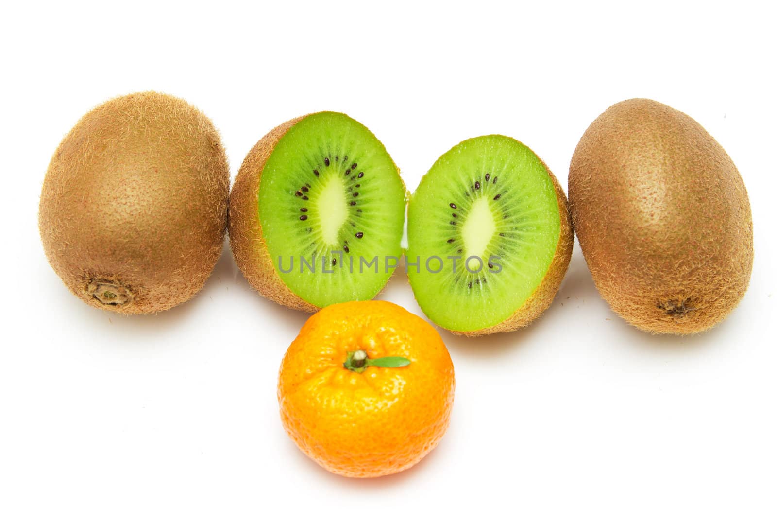 kiwi and a tangerine on a white background