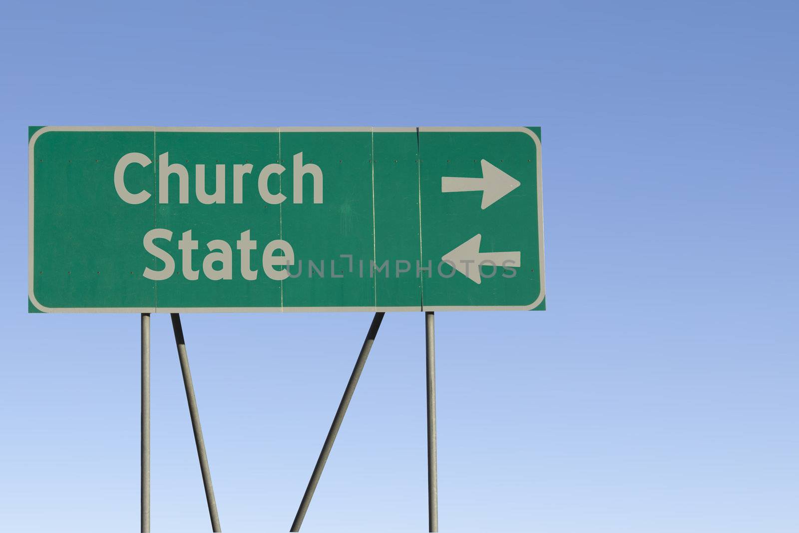 Church or state - road sign by jeremywhat