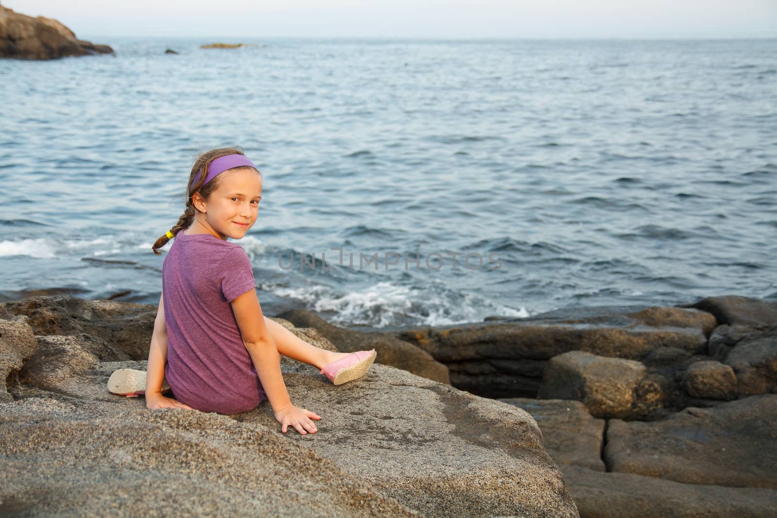 Little girl siting by the sea by Talanis