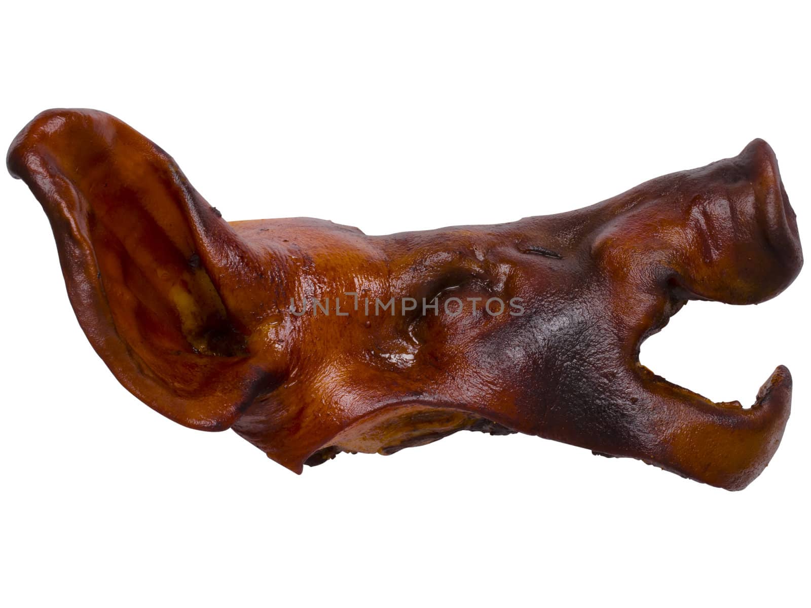 close up of braised pig head isolated on white