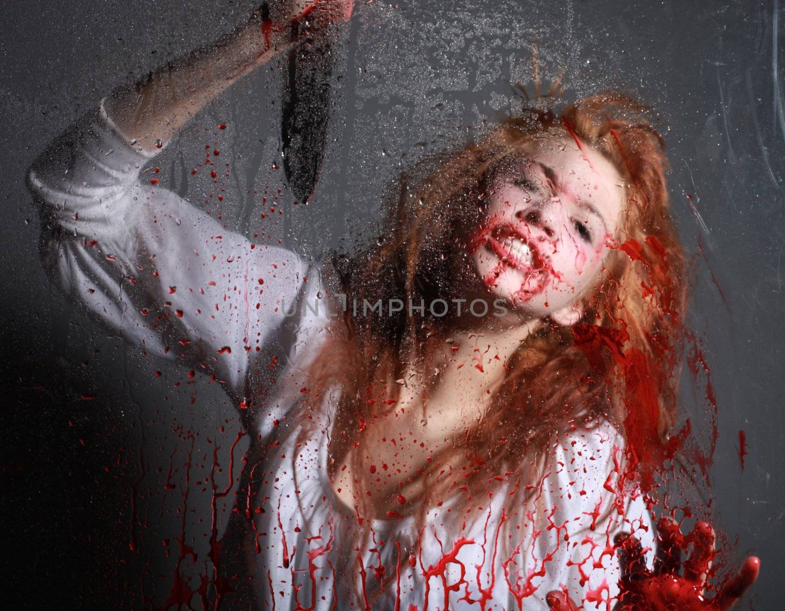 Horror Themed Image With Bleeding Freightened Woman by tobkatrina