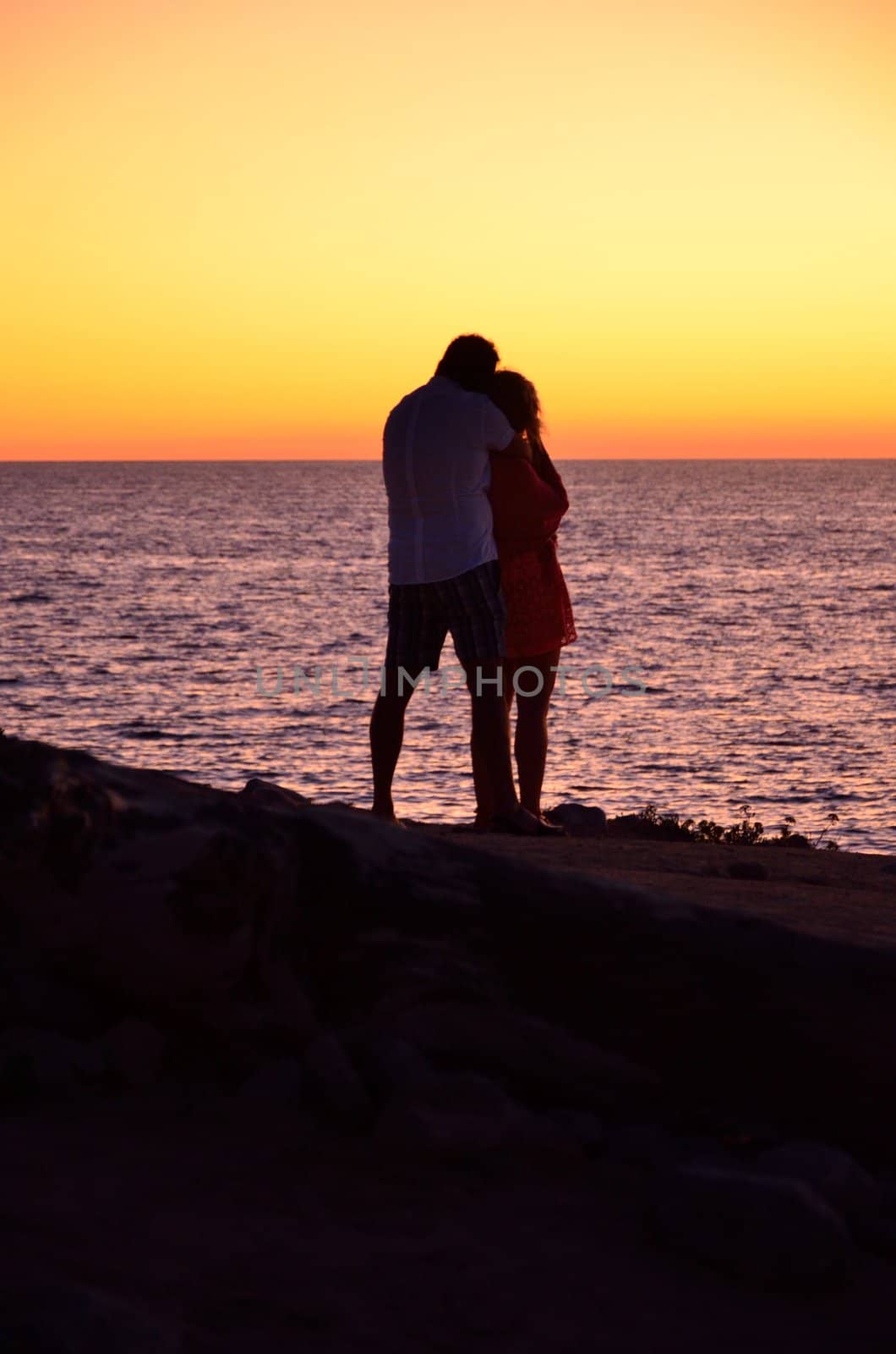 Couple watching sunset