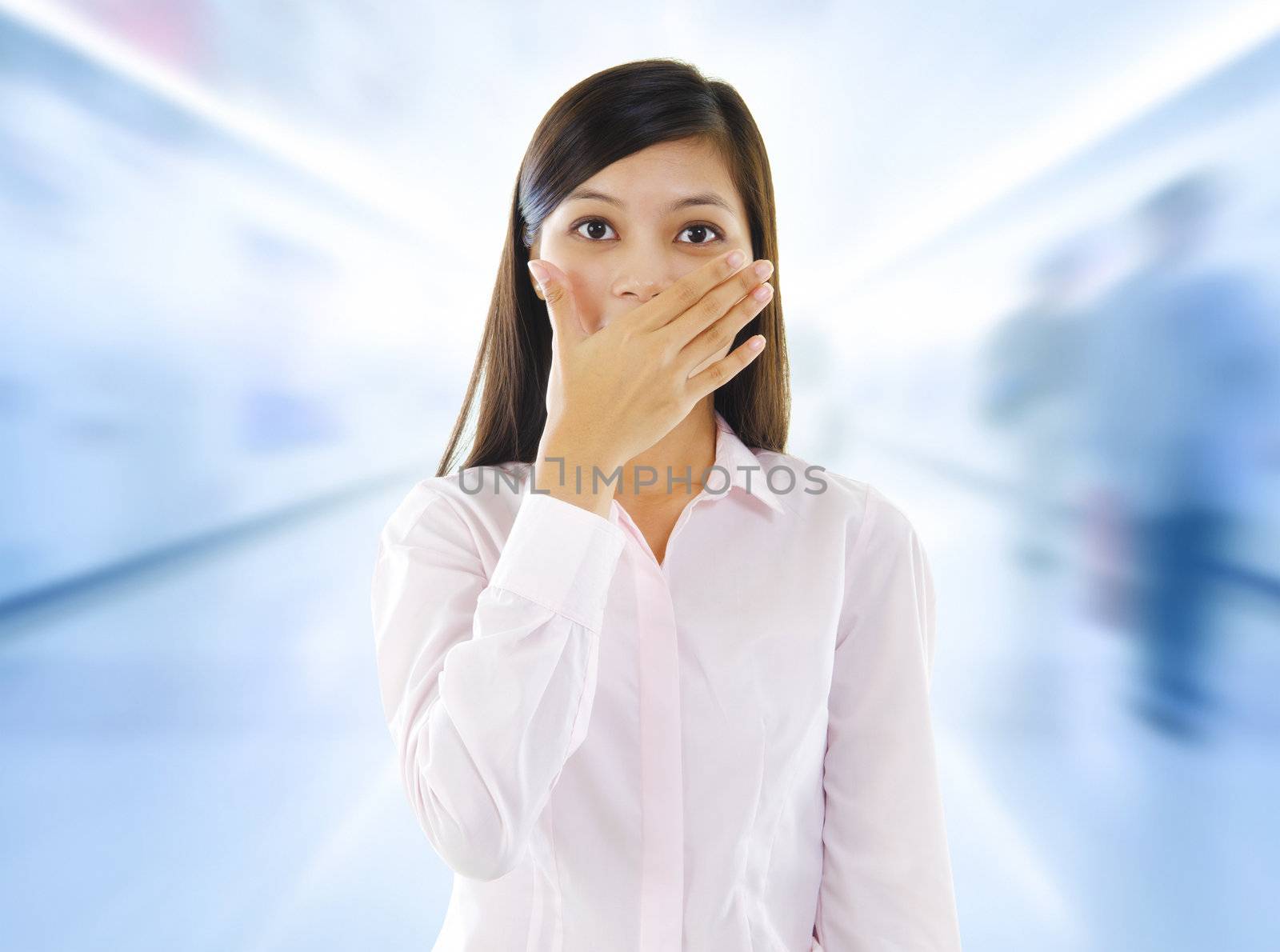 Asian woman with big surprise expression, hand covering mouth