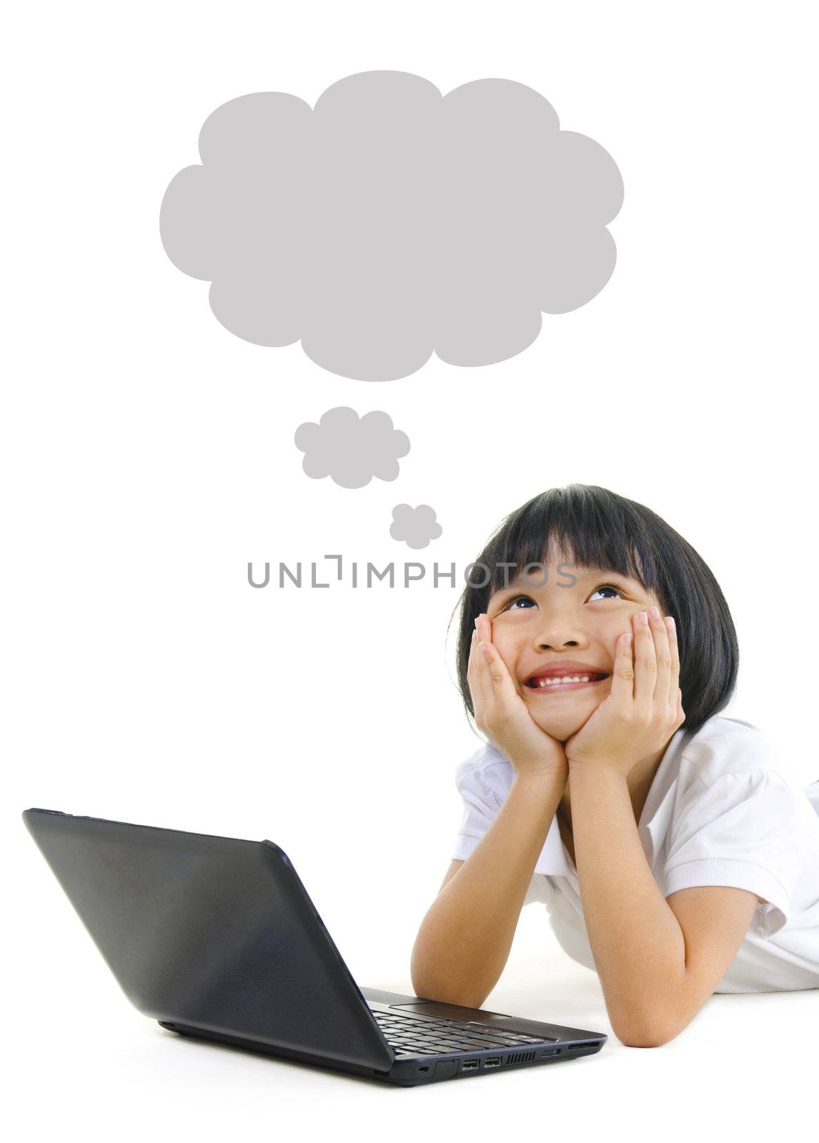 Pan Asian school girl using laptop and looking up
