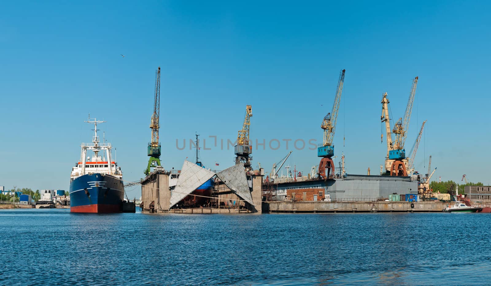 Shipyard with ships panorama at day time with clear sky