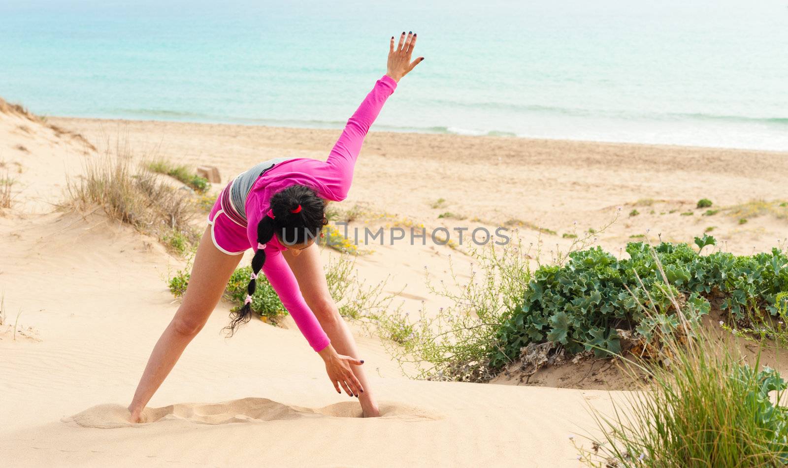 Beach workout between sunny dunes