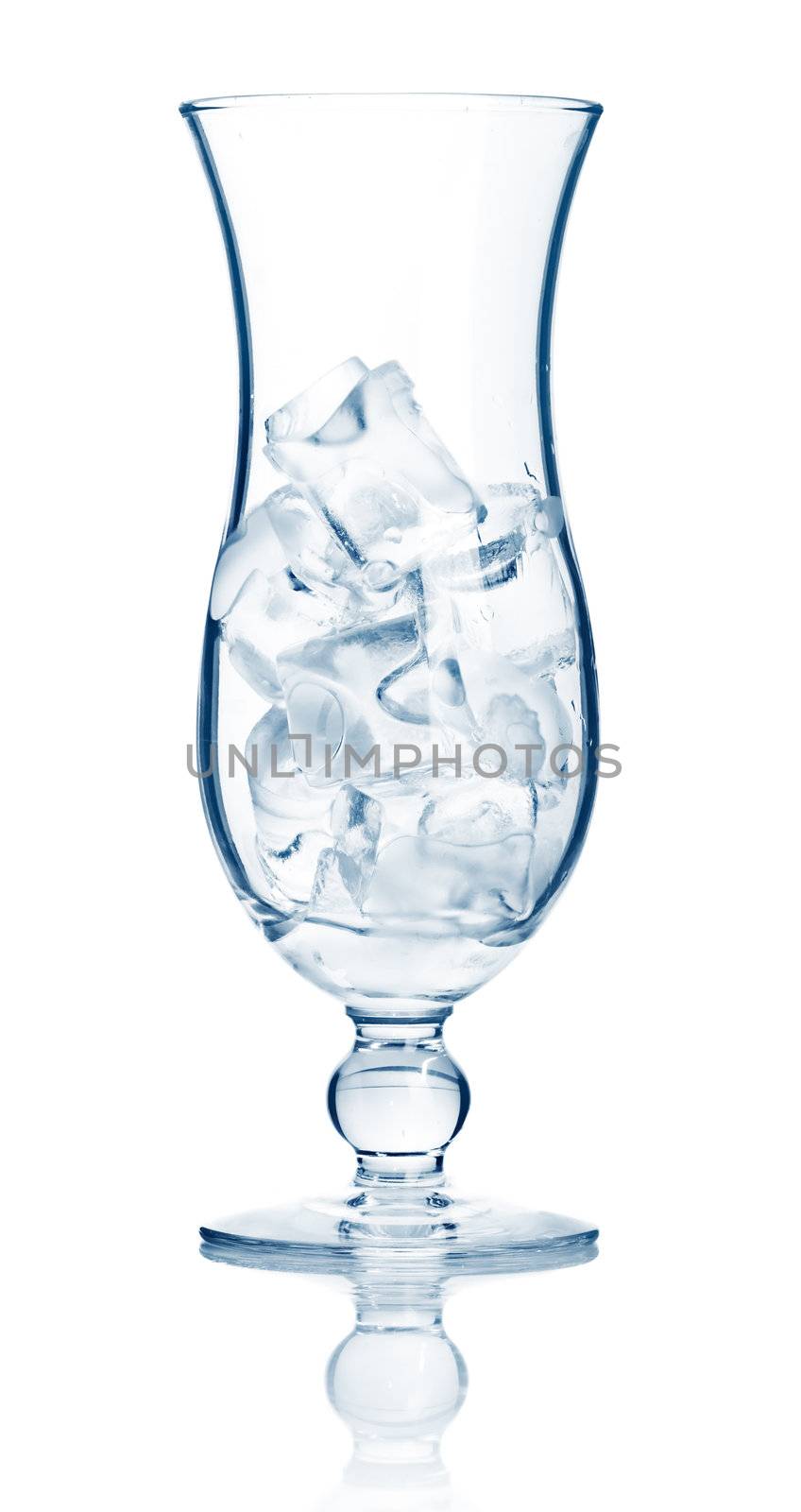 Highball cocktail glass full of ice cubes isolated by alphacell
